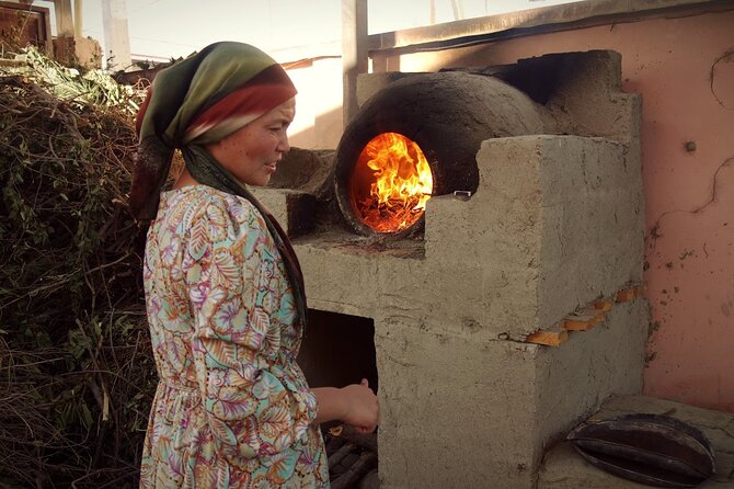 Private Samarkand Cooking Class with Market Tour & Transfers - Cooking over a wood-fired stove